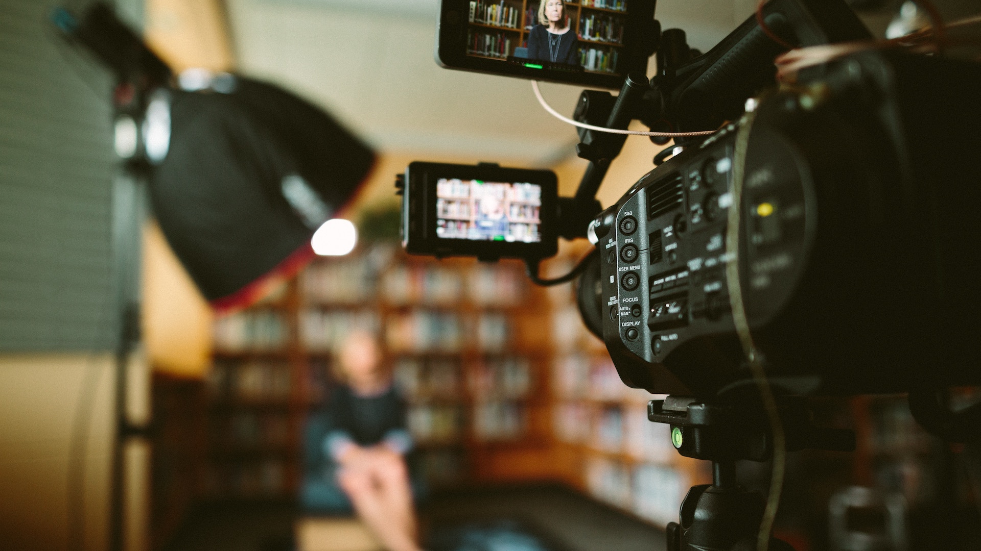 sam-mcghee-KieCLNzKoBo-unsplash A snap shot a Sony FS7 cinema camera system, while interviewing a subject for a documentary.